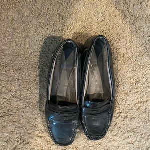 Black leather penny loafers